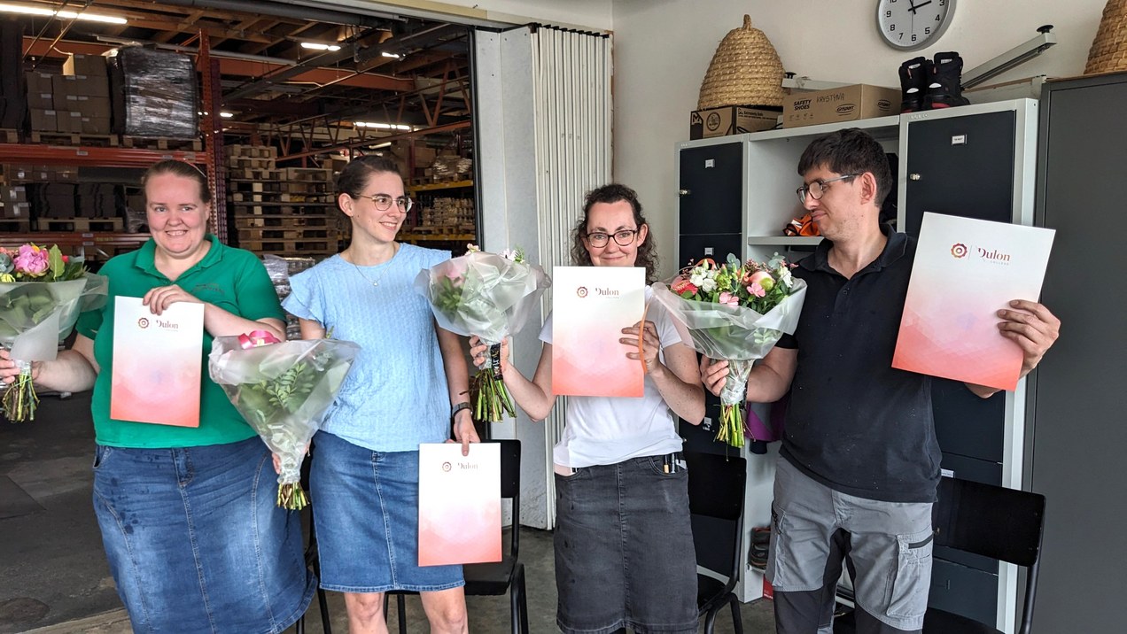 Vier blije collega's